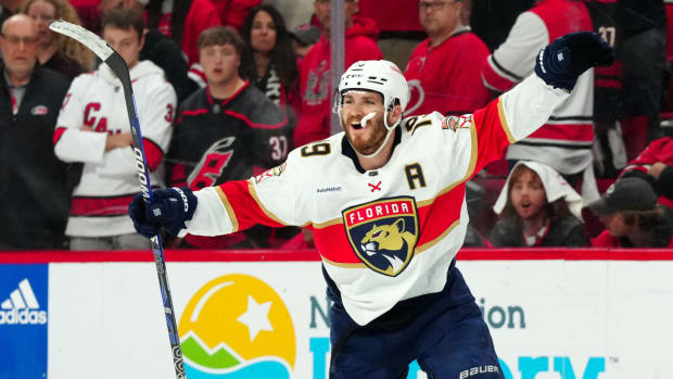 Panthers left wing Matthew Tkachuk reacts to his game-winning goal against the Hurricanes.